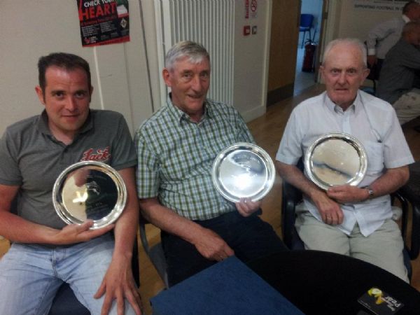 Anthony McCormack Tant Receives a presentation on behalf of his Late Father and Club founder John Mc cormack. Also Pictured is Founder members patsy Mc Cann and Norman Doherty.